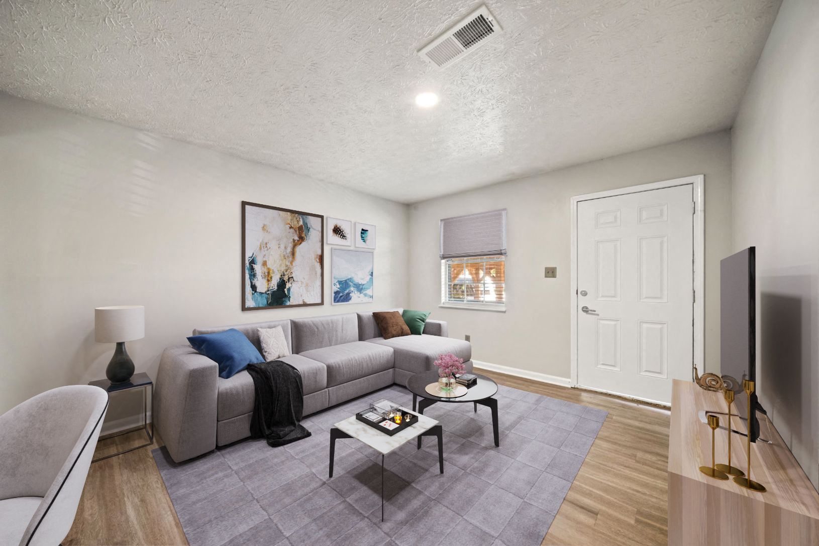 a living room with a couch and a table