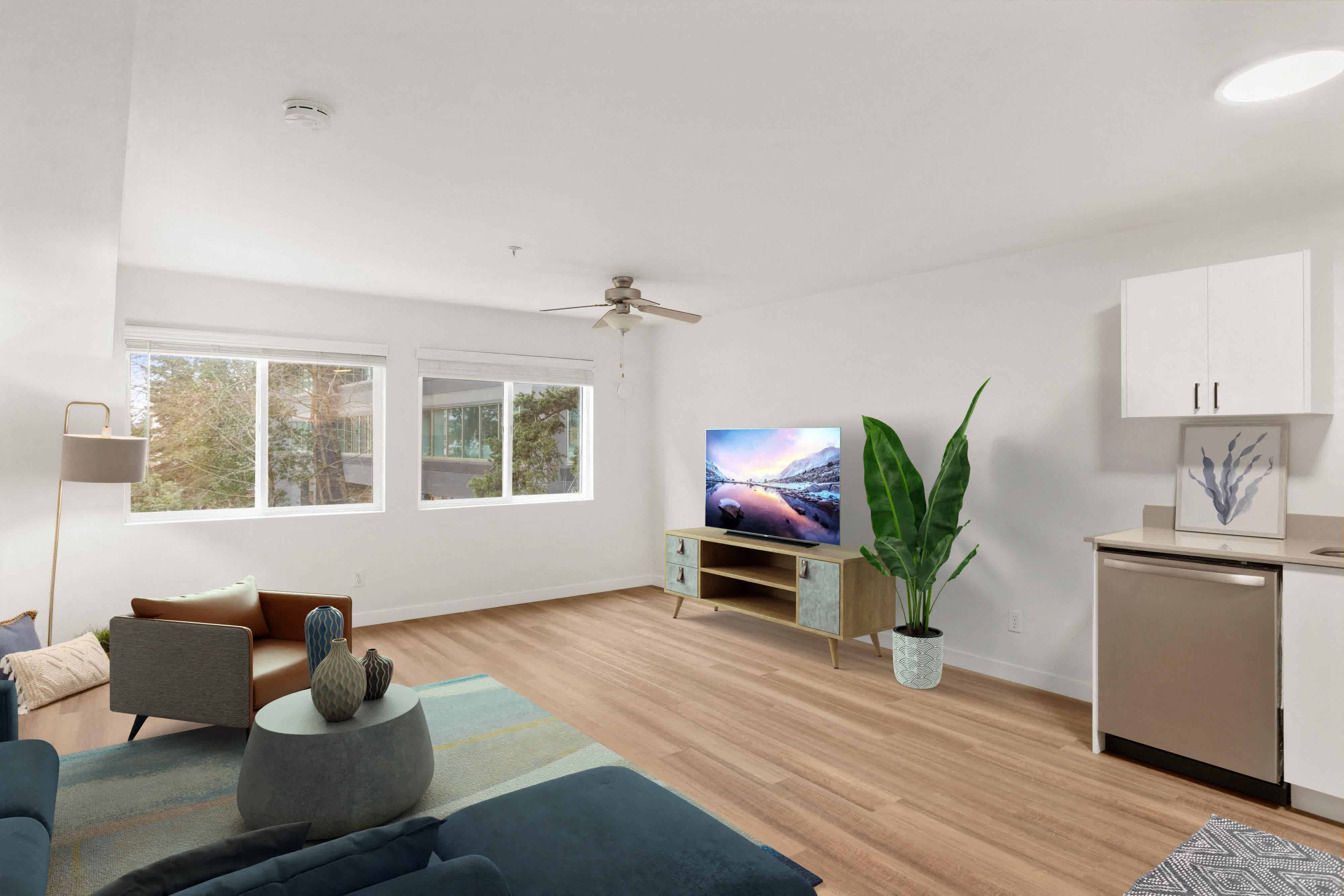 a living room with a couch and a tv