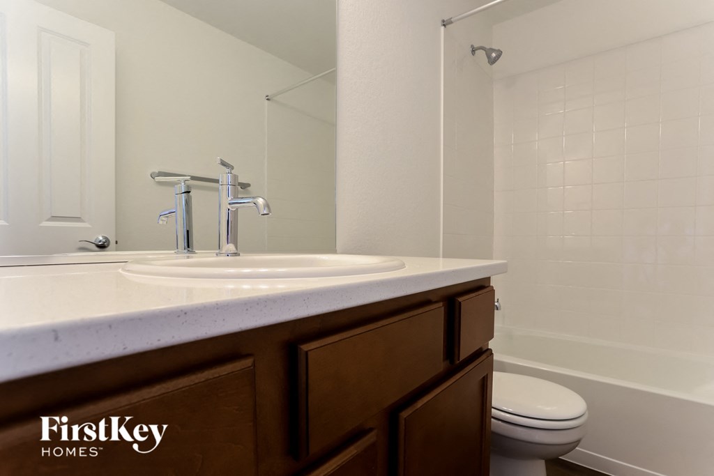 a bathroom with a sink and a toilet
