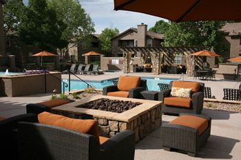 Albuquerque Apartments for Rent with Cozy Seating by the Pool with Couches and Fire Pit