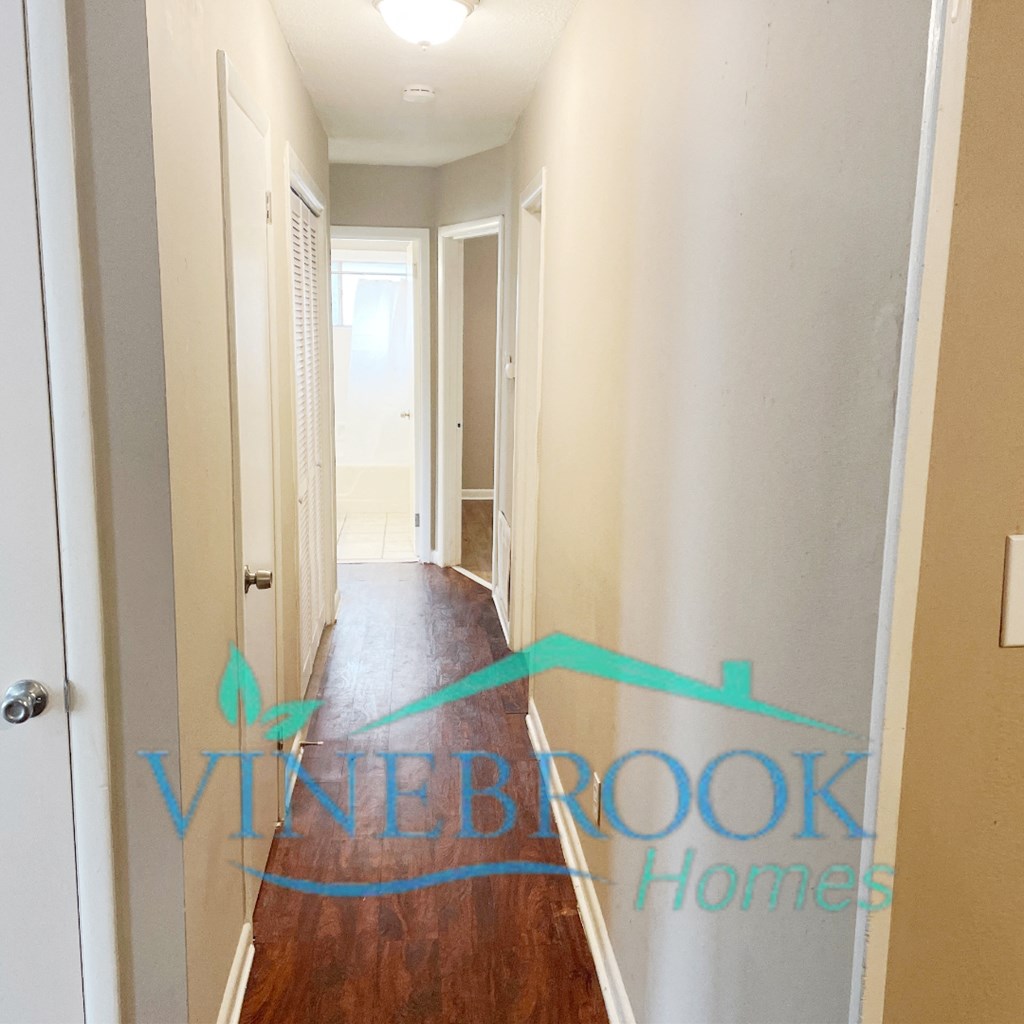 a blurry picture of a hallway with a blue line on the floor