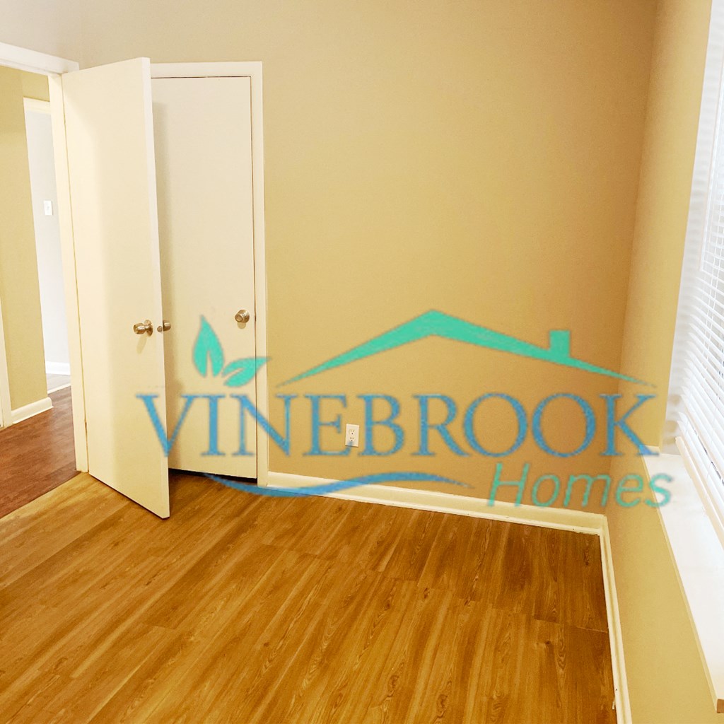 a bedroom with a wall sticker on the wall of a room