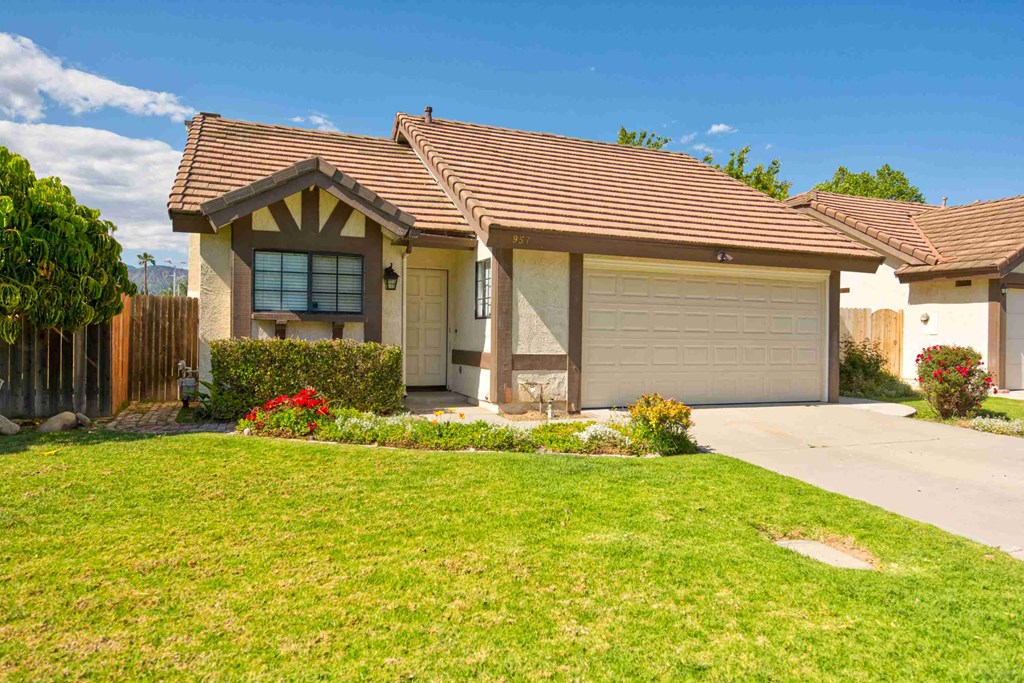 a house with a lawn in front of it