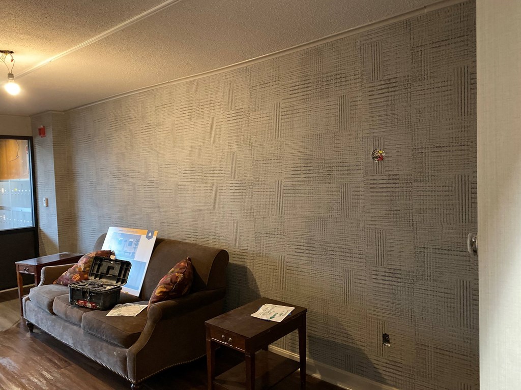 a living room with a couch and a table