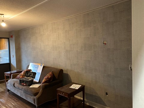 a living room with a couch and a table