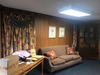 a living room with a couch and a table