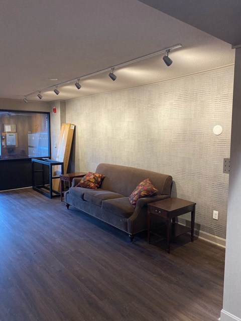 a living room with a couch and a table