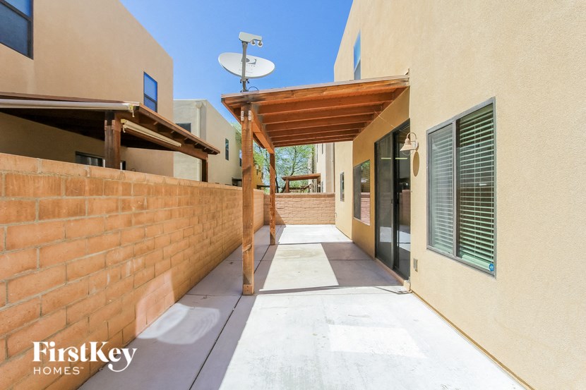 the entrance to the home has a long walkway