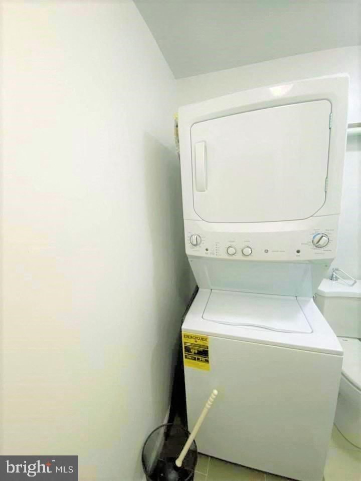 a white washer and dryer in a white room