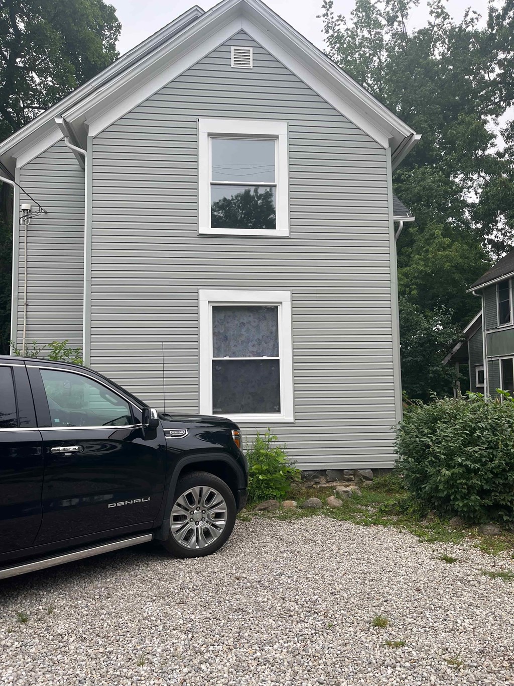 a house with a car parked in front of it