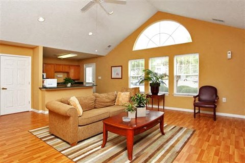 a living room with a couch and a table