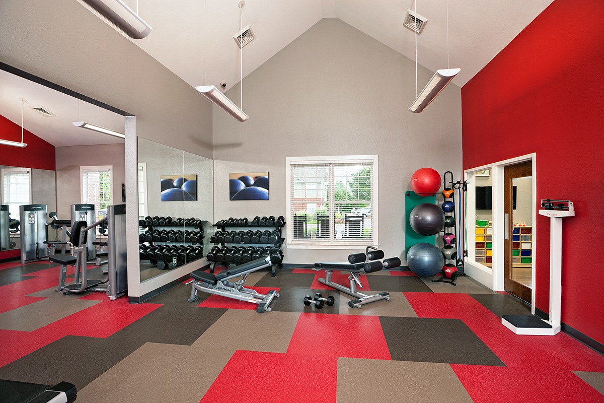 the gym at the flats at big tex apartments