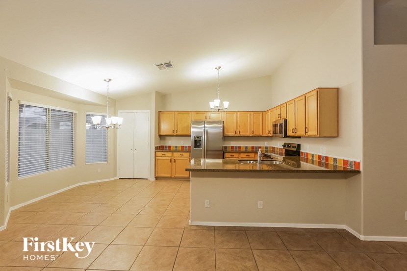 a kitchen with a counter top and a sink