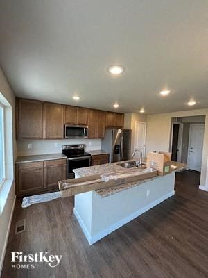 a kitchen with a counter top and a sink
