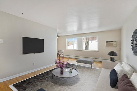 a living room with a couch and a table