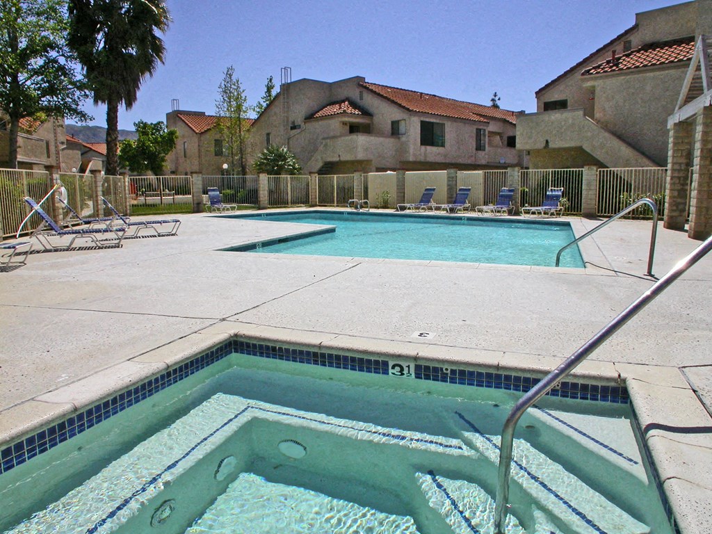 the pool and spa at the apartments for rent