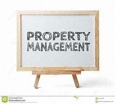 a sign that says property management on a wooden frame