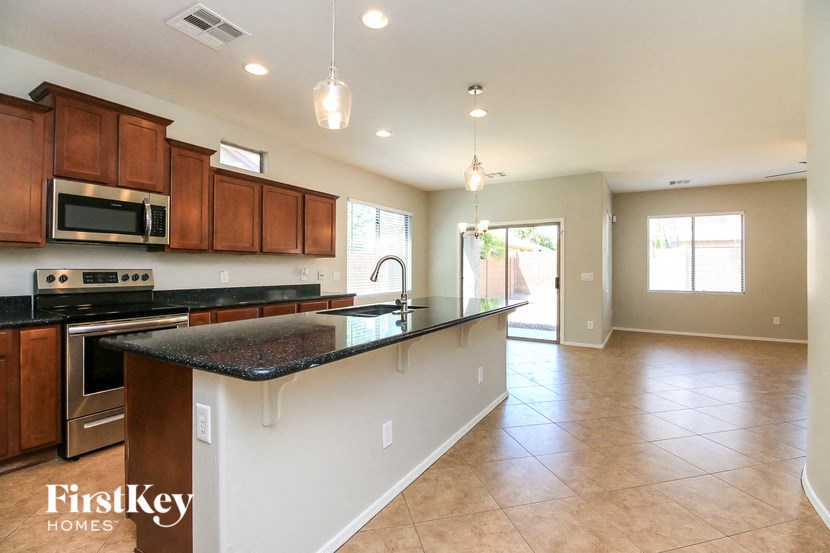 a kitchen with a counter top and a sink