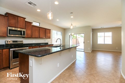 a kitchen with a counter top and a sink