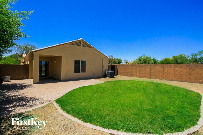 a house with a lawn in front of it