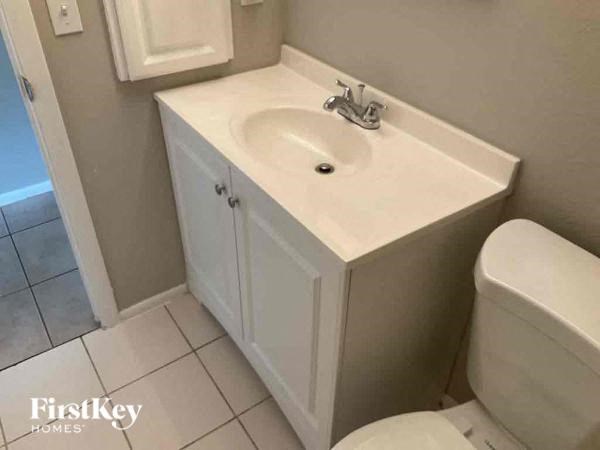 a bathroom with a sink and a toilet