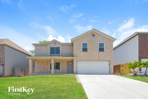 A house with a garage is for sale by FirstKey Homes.