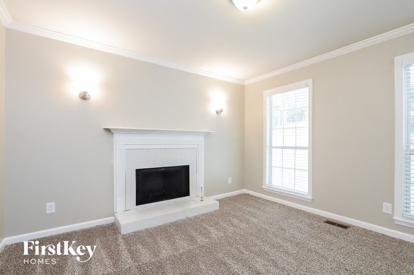 the living room of a home with a fireplace