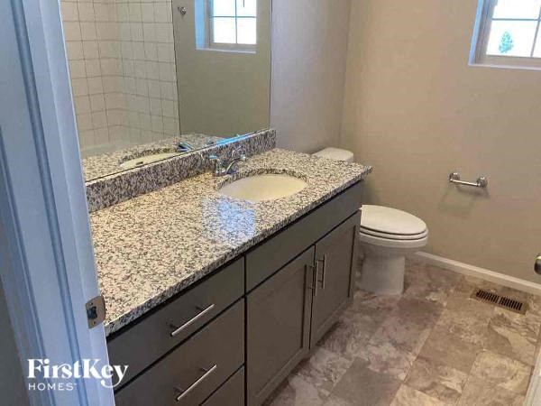 a bathroom with a sink and a toilet