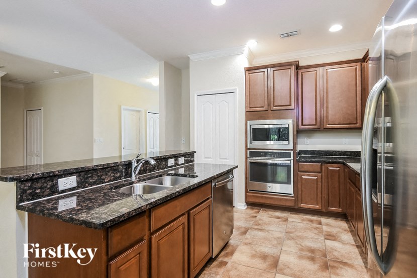 a kitchen with a counter top and a sink