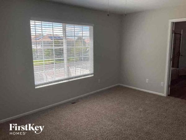 an empty room with a large window in it