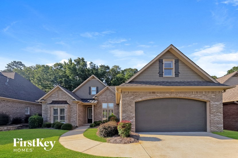 A house with a garage is for sale by FirstKey Homes.