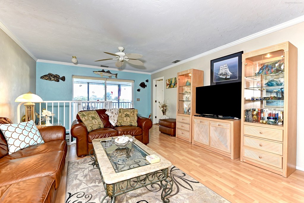 a living room with a couch and a television