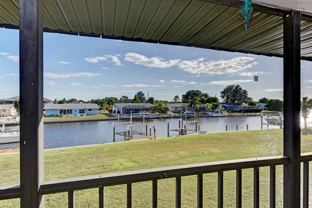 a view of the water from the deck of a boat dock