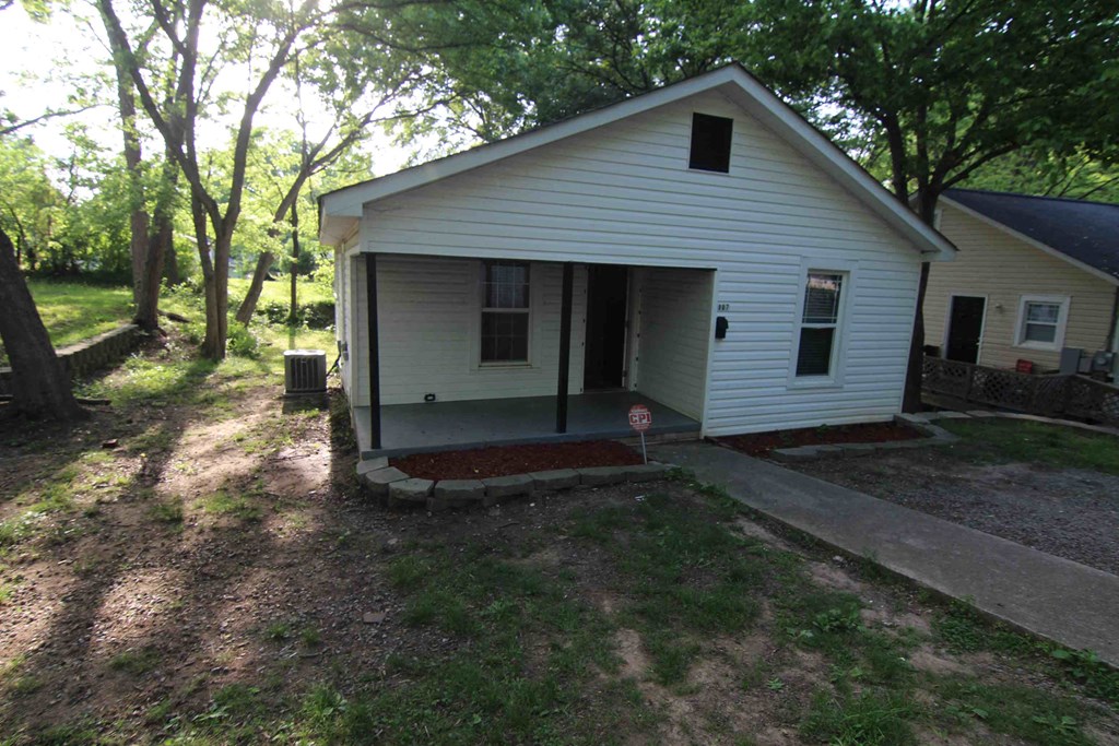 a view of the front of the house from the driveway