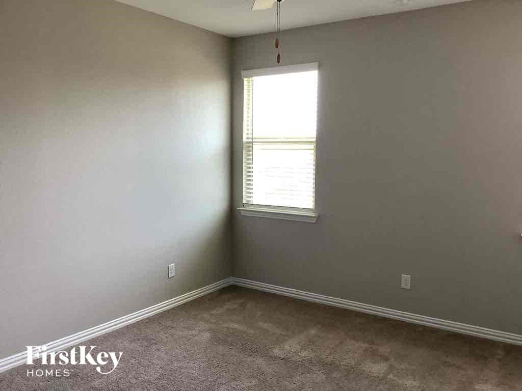 an empty room with a window in it