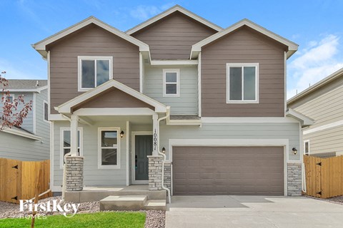 a tan and with a garage door