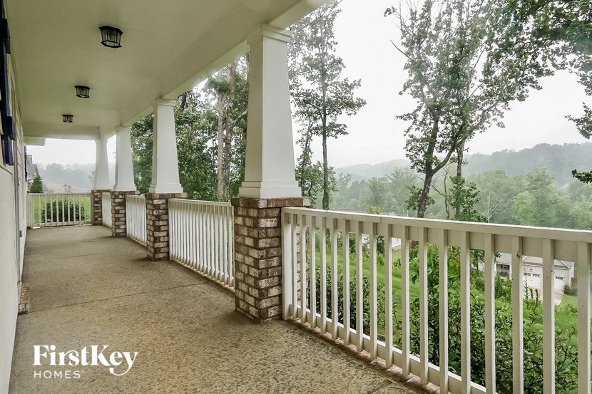 the view from the porch of the hickory homes porch railings and pillars