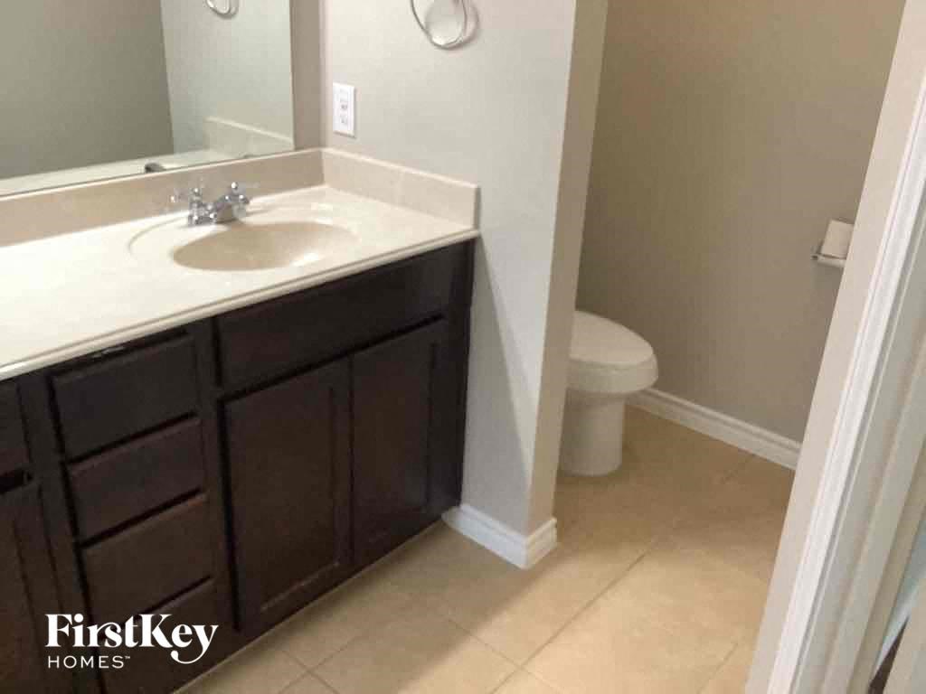 a bathroom with a sink and a toilet
