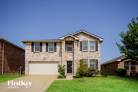 A house with a garage is for sale by FirstKey Homes.