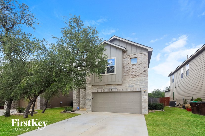 A house with a garage is for sale by FirstKey Homes.