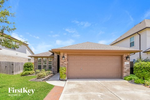 a garage door in front of a house