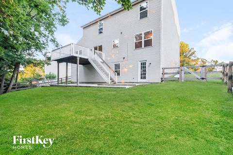 an old with a deck on the side of it