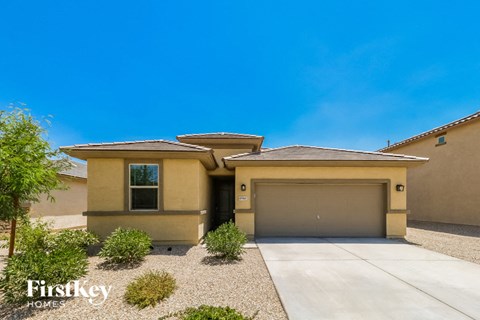 a brand new house with a garage door