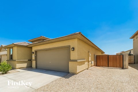 a house with a driveway and a garage door