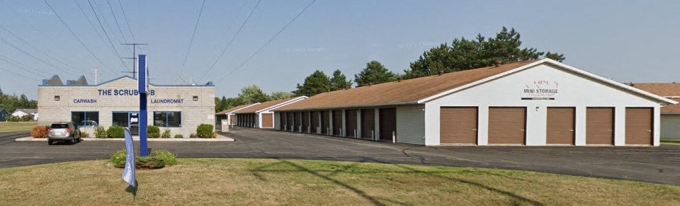 a building with a car parked in front of it