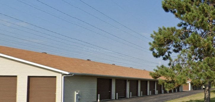 a building with a row of power lines in front of it