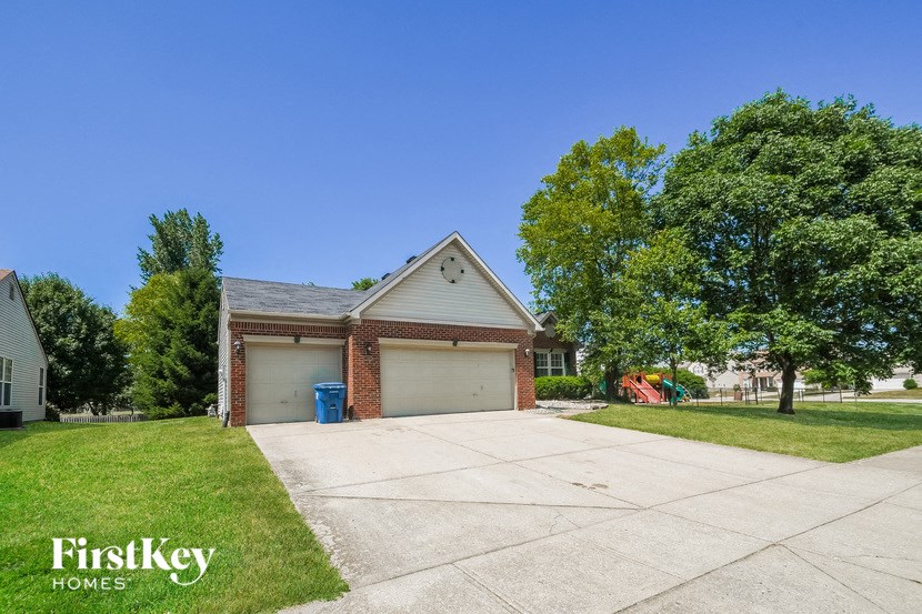 a house with a driveway and a garage door