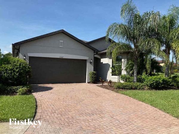 a house with a driveway and a garage door