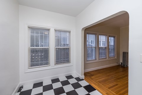 A room with a black and white checkered floor.