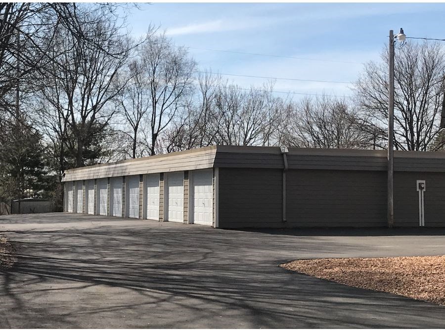 a building with a row of garage doors
